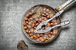 The hazelnuts in an old pan.