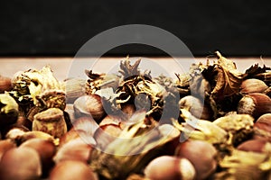 hazelnuts scattered on the table close-up copy space