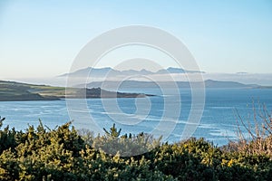 A Hazey Arran in the West Coast of Scotland with a icy Haar Cloud lying over the Island