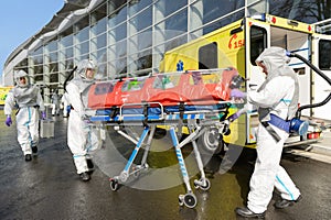 Corona virus medical team pushing stretcher