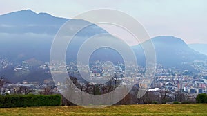 Hazy Alpine landscape from Porza, Ticino, Switzerland