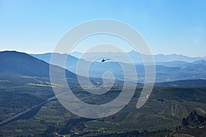 Hazy mountains ridges on background