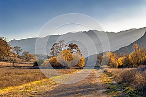 Hazy southern California mountains landscape and country road. photo