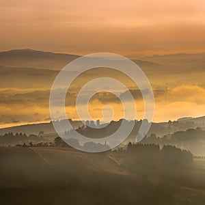 Hazy Sunrise over tuscan Hills