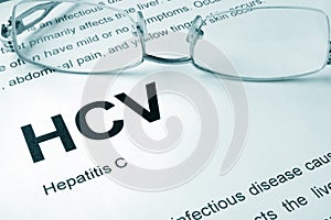 HCV written on a page. Hepatitis C. photo