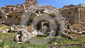 HD fooage. Abanoned houses in rocks. Handheld camera