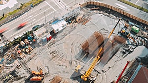 HD Hyperlapse Aerial View On Construction Site. Various Machinery With Workers Are Engaged In Repairing Development On