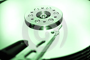 HDD - A green Hard Disk Drive is open