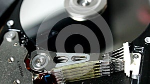 HDD - A Hard Disk Drive is open, broken and spin out