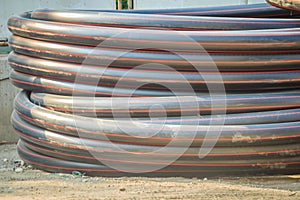 HDPE pipes for water supply and electrical conduit at construction site