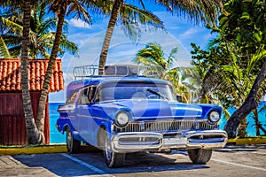 HDR - American blue Mercury classic car parked on the beach in Varadero Cuba - Serie Cuba Reportage