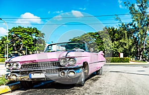 HDR - American pink convertible vintage car in the front view in Varadero Cuba - Serie Cuba