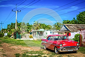 HDR - American red Dodge classic car parked on the side street in the province Matanzas in Cuba - Serie Cuba Reportage