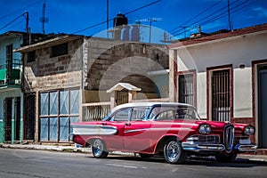 HDR - Beautiful red american vintage car with a white roof parked in Havana Cuba - Serie Cuba Reportage