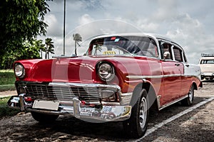 HDR Cuba red american Oldtimer parked in Varadero