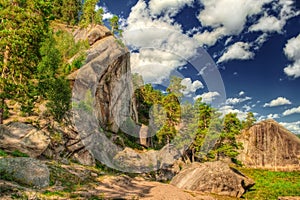 The HDR image of rocks with blue sky.