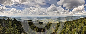 HDR panorama with forest mountains and cloudy sky