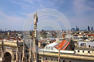 HDR photo of the white marble statues of Cathedral Duomo di Milano on piazza, Milan cityscape and Galleria Vittorio Emanuele II