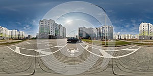 360 hdri panorama view with skyscrapers in new modern residential complex on parking for people with disabilities in