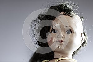 Head of beatiful scary doll like from horror movie