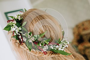 Head blond girl wreath flowers pigtail room