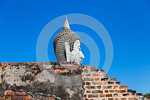 Head of buddha statue at historical park Ayutthaya, Thailand.