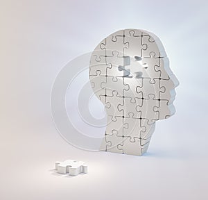 A head build out of puzzle pieces missing a single piece