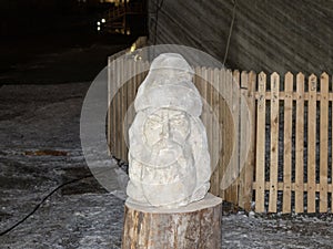 The head is carved from salt on a wooden stand in salt mines in Slanic - Salina Slanic Prahova - in the town of Prahova in Romani