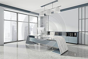 Head of company`s office interior with table and desktop computer, shelf with folders, white armchairs. Mockup copy space wall.