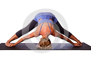 Head on floor yoga inversion pose photo