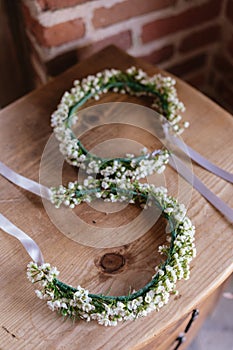 Head flower branches made of white gibson flowers