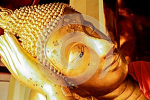 Head of golden reclining Buddha Image