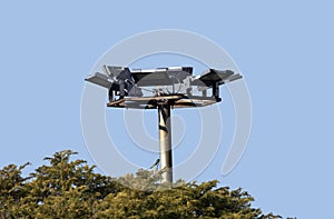 Head of an high-intensity lamps group in a park