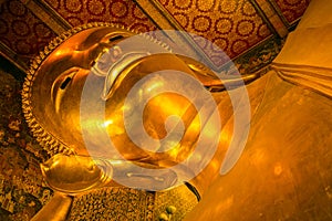 Head of Hue Golden Buddha reclining(Phra Saiyat) in Wat Pho.