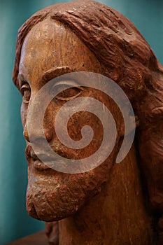 A head of Jesus made of wood. Wood statue by Konenkov photo