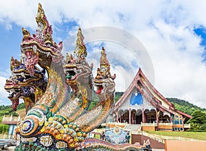 Head of king naga thai dragon statues at Wat Pa Huay Lad public temple landmark of Phu Ruea, Loei, Thailand