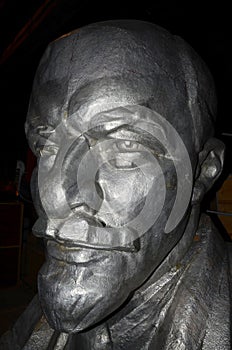 The head of Lenin, standing behind the curtains of the House of Culture.