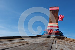 Head of long tail boat blue sky background Thailand