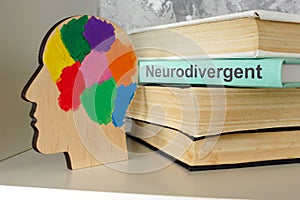Head model and book neurodivergent. Neurodiversity and cognitive differences. photo