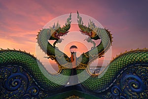 Head of Naga snake in Wat Khao Phra Kru Temple, Si Racha District, Chonburi, Thailand. Landmark tourist attraction. Thai