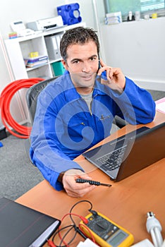 Head office man on phone