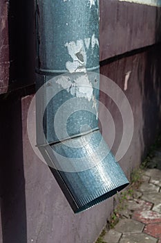 The head of an old drainpipe of a residential building