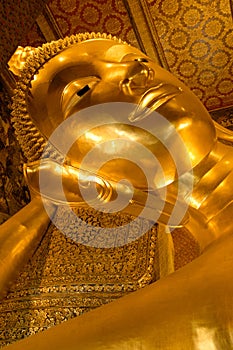 Head of the Reclining Buddha. Bangkok, Thailand