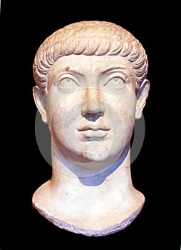 Head of Roman emperor Constantius II or Constans, isolated on black background