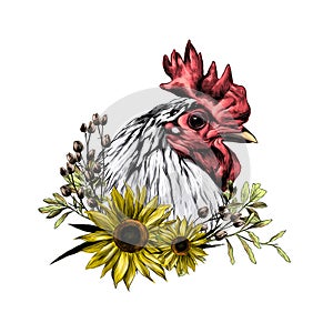 Head of the rooster in profile with wreath in the form of a frame of sunflower leaves and dry grass from below