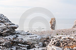 Head-shaped rock formation on the island of FÃÂ¥rÃÂ¶, Langhammars RaukomrÃÂ¥de, Sweden, Gotland, Europe photo