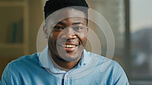 Head shot African American businessman ethnic guy looking at camera happy smiling male multiracial man office manager