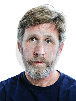 Head shot of a casually dressed caucasian man with a beard.