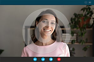 Screen view smiling young mixed race woman holding video call.