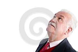 Head shot of handsome senior looking upwards